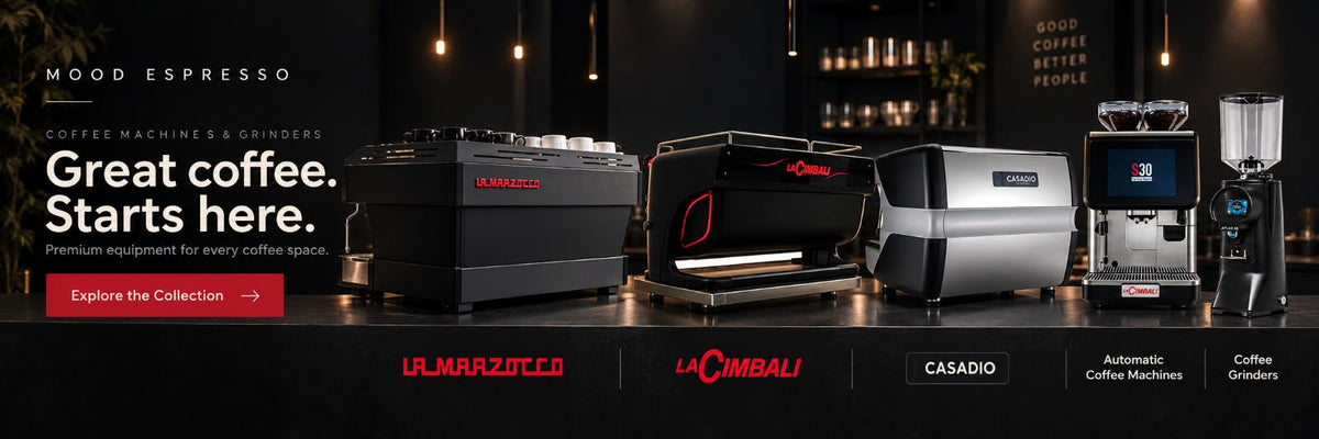 La Marzocco, LaCimbali and Casadio coffee machines in a dark café