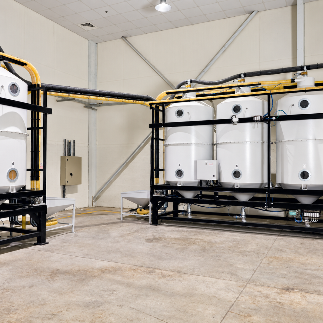 Coffee storage and processing equipment at Mood Espresso's Dubai roastery