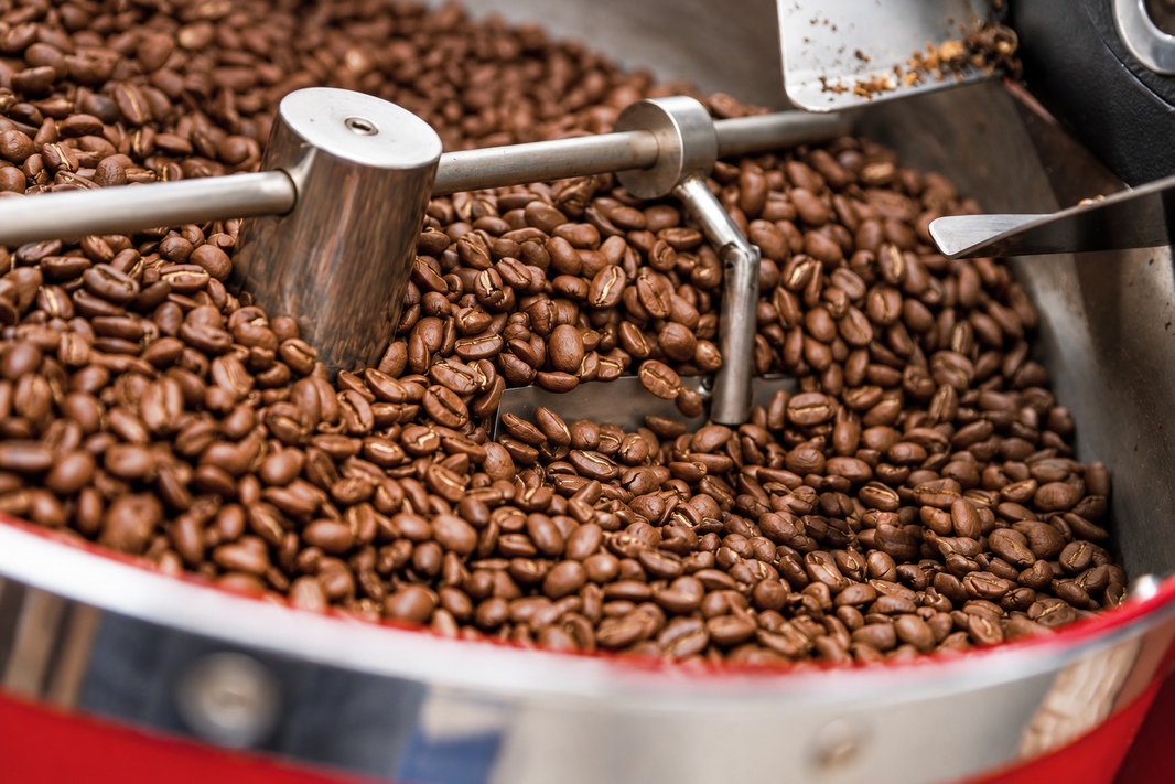 
Freshly roasted coffee beans in the cooling tray at Mood Espresso's roastery